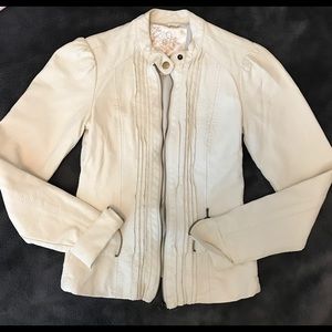 Jacket.  Polyurethane, off white color